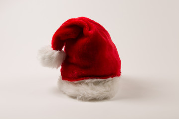 Santa hat on white background white pom pom to the side