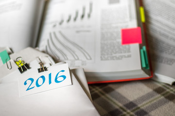 2016; Stack of Documents with Large Amount of Analytic Material.