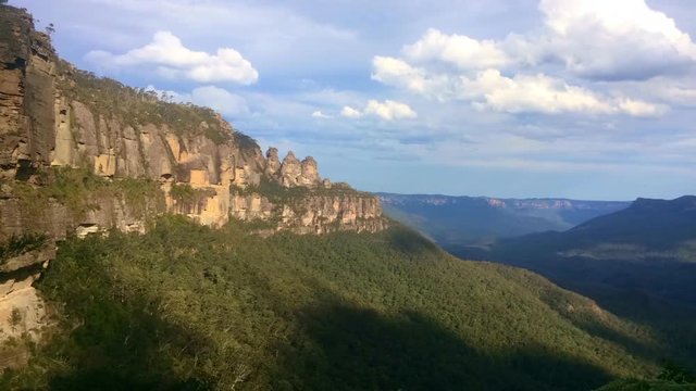 Timelapse landscape of The Three Sisters rock formation in the Blue Mountains of New South Wales, Australia, on the north escarpment of the Jamison Valley.