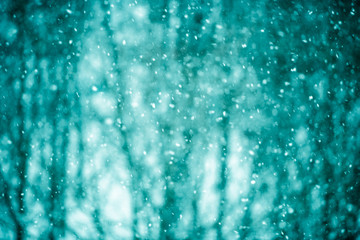 Naklejka na ściany i meble Winter blur background with snowflakes