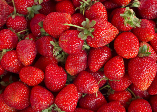 Strawberries. Background from fresh strawberries, Red strawberries. Strawberries at market. Strawberries fruits. Healthy strawberries.(selective focus)