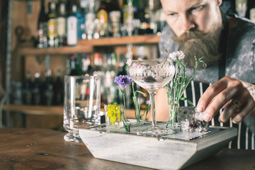 Barman is making cocktail