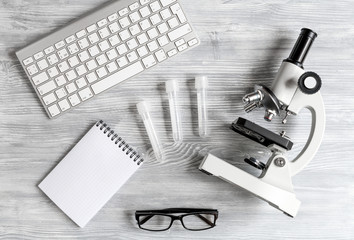 lab assistant desk with microscope top view
