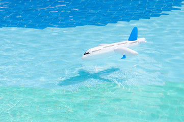 Inflatable airplane in swimming pool