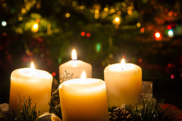 advent wreath decoration with burning candle