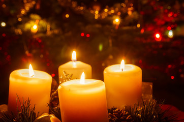 advent wreath decoration with burning candle
