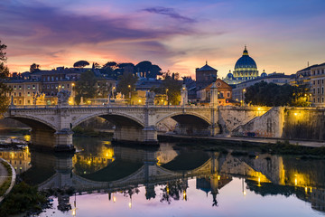 St. Peter's cathedral (Basilica di San Pietro) and bridge (Ponte Vittorio Emanuele II) over river Tiber in the evening after sunrise, Rome, Italy, Europe - obrazy, fototapety, plakaty