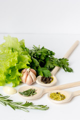 fresh salad with garlic and spices on white background