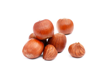 Group healty hazelnuts isolated on white background