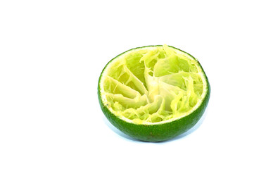 Squeezed lemon isolated on a white background