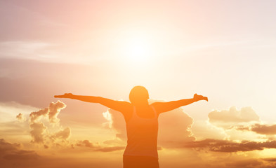 Fototapeta premium Young woman raise hands up for her success, Concept of Success i