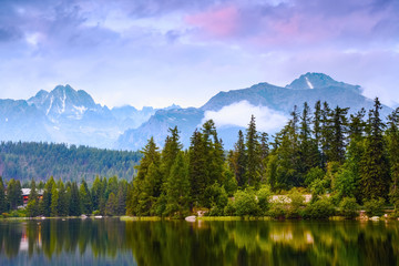 Calm lake, fantastic mountains and sky.