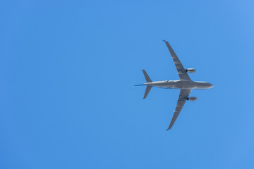 flying up passenger airplane from under