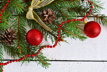 Naklejka na ściany i meble Christmas background - fir with cones and balls 