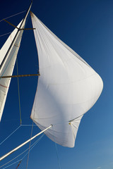 Flying the symmetric spinnaker on the yach in strong wind