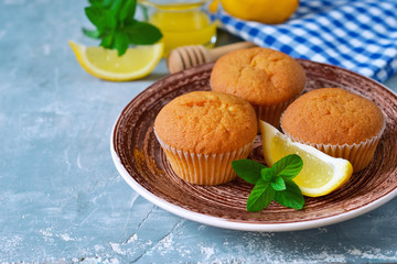 Homemade, lemon muffins with honey and mint 