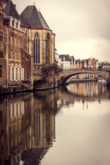 Fototapeta na wymiar Reflection of St. Michael's Bridge in Gent, Belgium