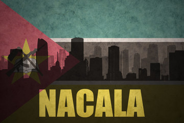 abstract silhouette of the city with text Nacala at the vintage mozambican flag