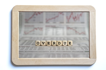 overdue word builr with letter cubes