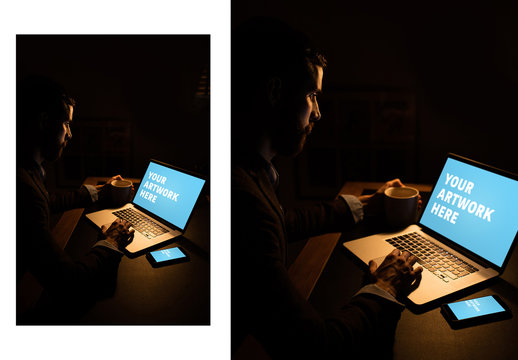 User with Laptop and Smartphone in Dark Room Mockup 1