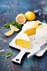Lemon almond gluten free cake with cream cheese frosting, selective focus