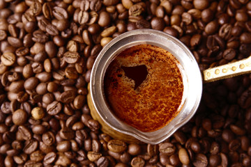 Coffee beans with cezve