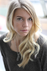 Head Shot of a Beautiful Blond Woman with Brown Eyes