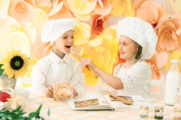 happy little children in the form of a chef to prepare delicious