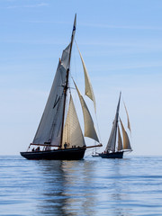 Two Bristol Pilot cutters beating to windward in light airs