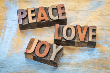 peace, love and joy in wood type