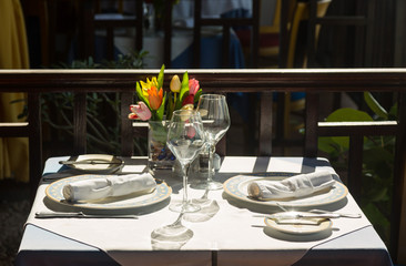 Table setting exterior restaurant in sunshine