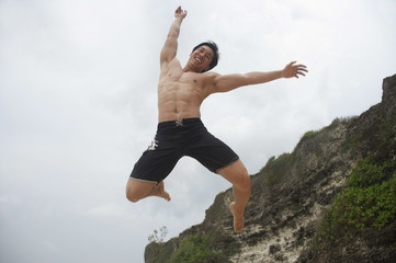 Man jumping in air