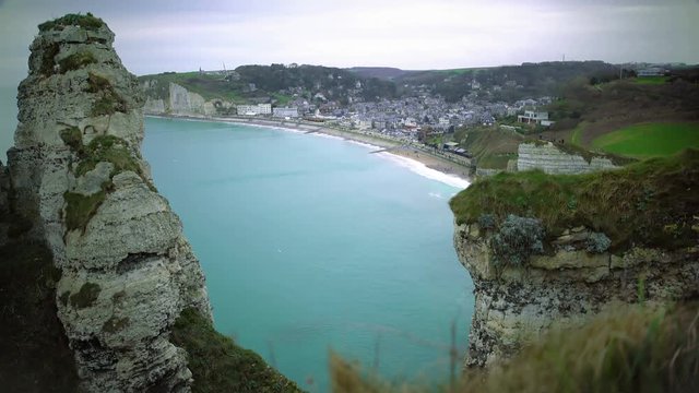 Aerial view of Etretat resort town in France, azure water, relaxing landscape