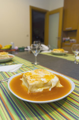 francesinha with hot sauce