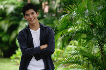A man in a garden smiles at the camera © Alexander