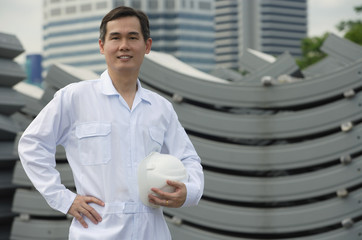 Man with hard helmet looking at camera