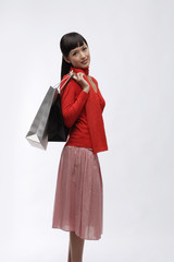 Young woman with shopping bags