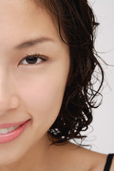 Fototapeta premium Cropped face of a woman smiling at the camera