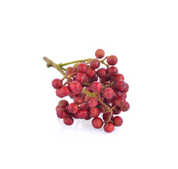Fototapeta premium Szechuan pepper (Zanthoxylum piperitum), fruits on white