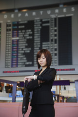 Young woman waiting at the airport