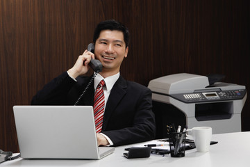 A businessman on the telephone