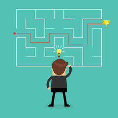 Businessman with a maze and think about solution to success.