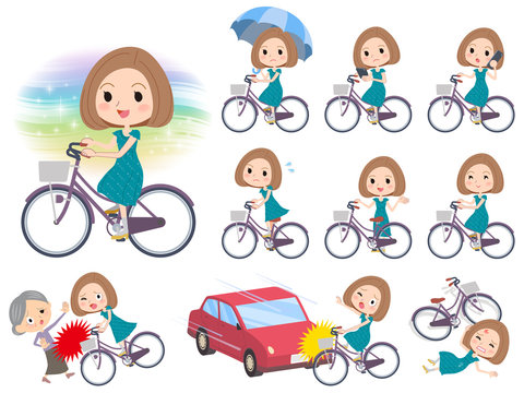 Bob hair green dress women ride on city bicycle