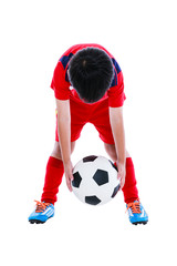 Asian soccer player holding his soccer ball, studio shot. Isolated on white background.