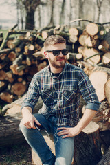 Man with gadget and glasses