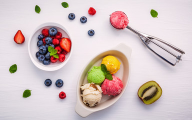 Naklejka na ściany i meble Colorful ice cream with mixed berry raspberry ,blueberry ,strawb