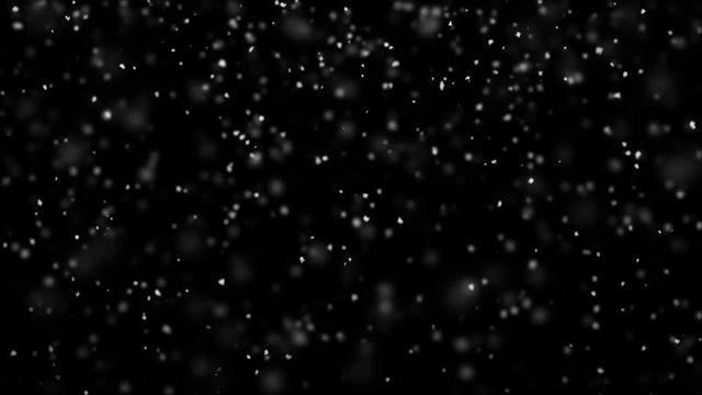 Snowflakes falling in turbulent air 3D render. Computer generated abstract christmas animation background seamless loop 4k UHD (3840x2160)

