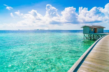 Fotobehang Beautiful water villas in tropical Maldives island  . © jannoon028