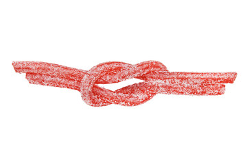 reef knot of candy. red chew candy stick in the shape of a square nautical knot. the concept of unhealthy eating. isolated on white background 