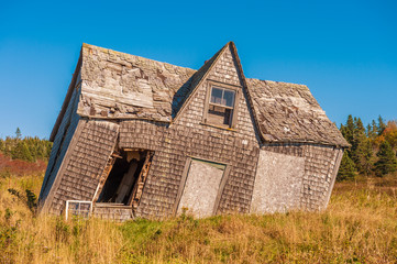 crooked leaning old house